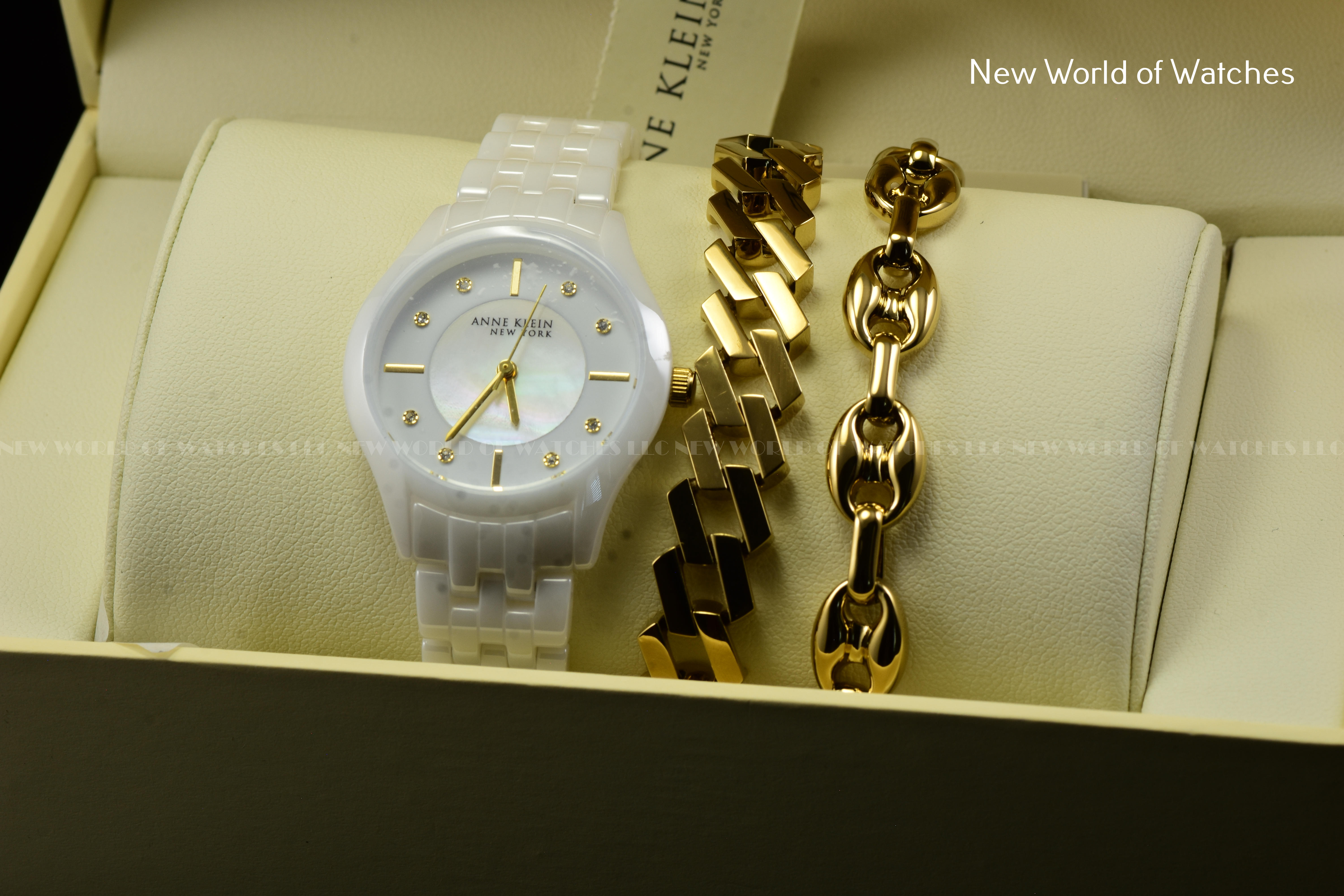 Anne Klein New York   12/7740WTST White Ceramic Watch w/ 2- Gold Tone Bracelets Anne Klein Ladies 12/7740WTST White Ceramic | Mercari main image 2